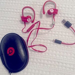 Like new! Beats by Dre headphones in chic cherry red.